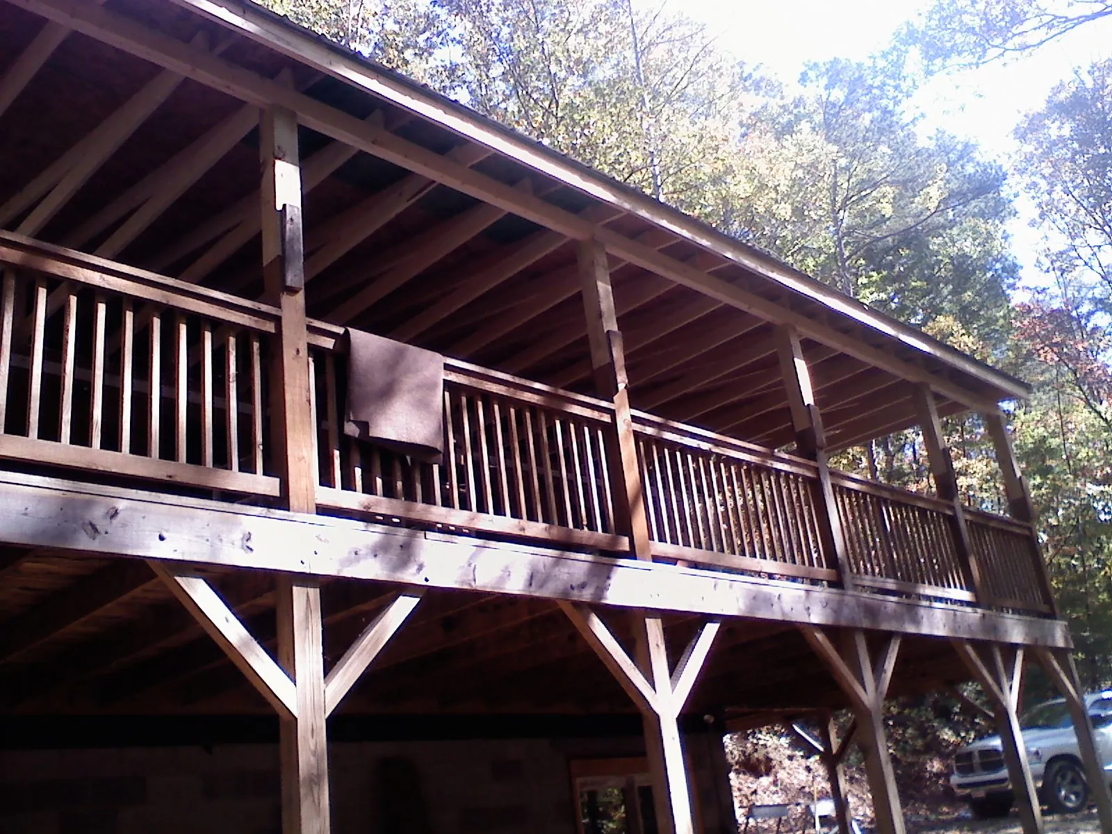 Timber framing under a new elevated porch and deck — Roof Leak Repair in Verndale by Roofing Brothers